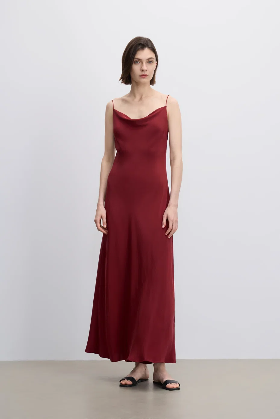 Deep-red floor-length slip dress.