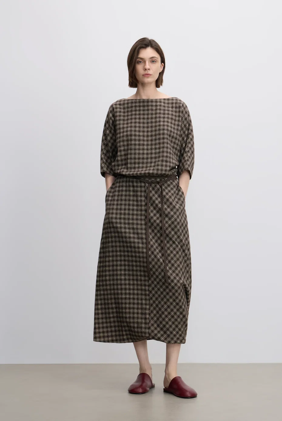Brown-check top with a matching midi skirt.